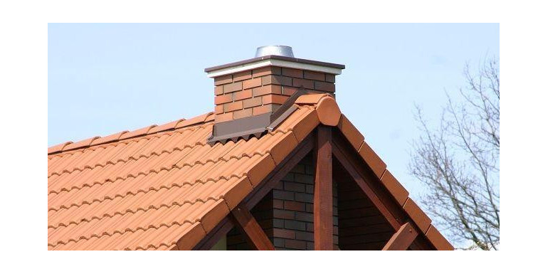 Montaż elementów systemu kominowego oraz zakończenie komina